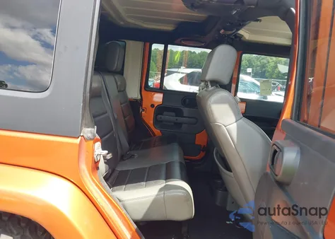 2010 Jeep Wrangler Unlimited Sahara from USA, damaged, VIN 1J4HB5H14AL232196